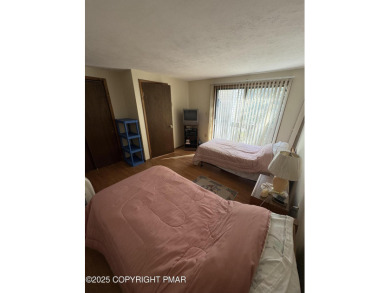 Spacious 3 bedroom home with fireplace and unfinished basement on Pocono Farms Country Club in Pennsylvania - for sale on GolfHomes.com, golf home, golf lot