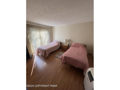 Spacious 3 bedroom home with fireplace and unfinished basement on Pocono Farms Country Club in Pennsylvania - for sale on GolfHomes.com, golf home, golf lot