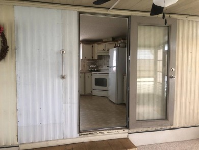 Located in the desirable gated, 55+ community this charming on Golden Lakes Golf Course in Florida - for sale on GolfHomes.com, golf home, golf lot