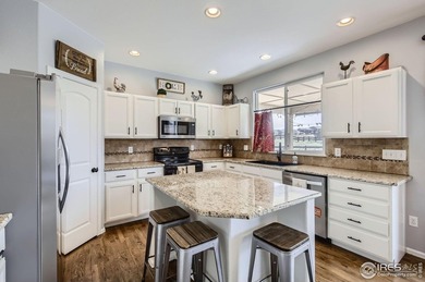 This beautiful 2-story home is situated on a spacious, 11,134 on Pelican Lakes Golf and Country Club in Colorado - for sale on GolfHomes.com, golf home, golf lot