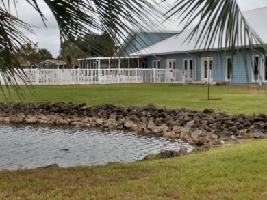 Located in the desirable gated, 55+ community this charming on Golden Lakes Golf Course in Florida - for sale on GolfHomes.com, golf home, golf lot