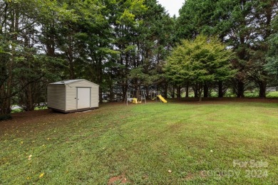 Welcome to this beautiful 5-bedroom, 2.5-bath home nestled in a on Catawba Springs Golf Course At Lake Hickory  in North Carolina - for sale on GolfHomes.com, golf home, golf lot