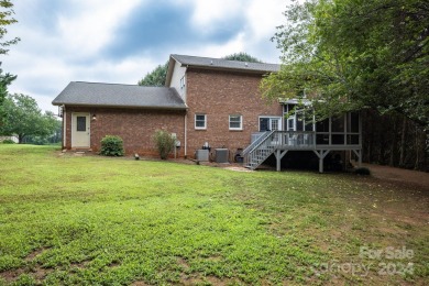 Welcome to this beautiful 5-bedroom, 2.5-bath home nestled in a on Catawba Springs Golf Course At Lake Hickory  in North Carolina - for sale on GolfHomes.com, golf home, golf lot