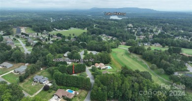 Welcome to this beautiful 5-bedroom, 2.5-bath home nestled in a on Catawba Springs Golf Course At Lake Hickory  in North Carolina - for sale on GolfHomes.com, golf home, golf lot