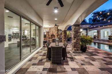 Nestled within an exclusive gated enclave in Paradise Valley on Camelback Golf Club in Arizona - for sale on GolfHomes.com, golf home, golf lot