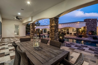 Nestled within an exclusive gated enclave in Paradise Valley on Camelback Golf Club in Arizona - for sale on GolfHomes.com, golf home, golf lot