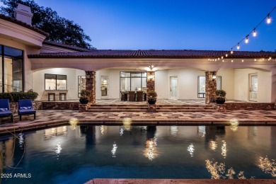 Nestled within an exclusive gated enclave in Paradise Valley on Camelback Golf Club in Arizona - for sale on GolfHomes.com, golf home, golf lot