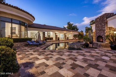 Nestled within an exclusive gated enclave in Paradise Valley on Camelback Golf Club in Arizona - for sale on GolfHomes.com, golf home, golf lot