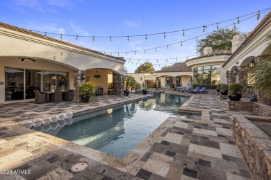 Nestled within an exclusive gated enclave in Paradise Valley on Camelback Golf Club in Arizona - for sale on GolfHomes.com, golf home, golf lot