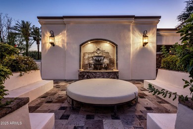 Nestled within an exclusive gated enclave in Paradise Valley on Camelback Golf Club in Arizona - for sale on GolfHomes.com, golf home, golf lot