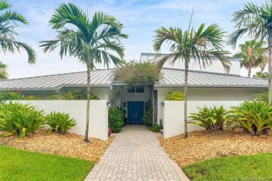 Estate Sale -- Nestled on a large, private cul-de-sac lot of on Sailfish Point Golf Club, Inc. in Florida - for sale on GolfHomes.com, golf home, golf lot
