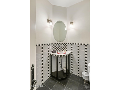 Nestled within an exclusive gated enclave in Paradise Valley on Camelback Golf Club in Arizona - for sale on GolfHomes.com, golf home, golf lot