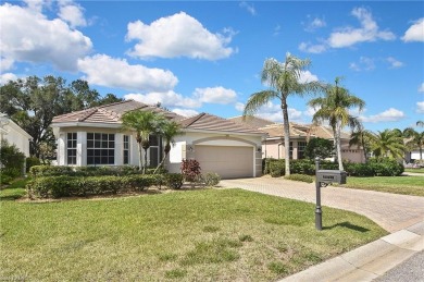 Nestled within the serene and gated Estero Country Club - The on Estero Country Club in Florida - for sale on GolfHomes.com, golf home, golf lot