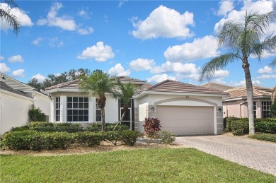 Nestled within the serene and gated Estero Country Club - The on Estero Country Club in Florida - for sale on GolfHomes.com, golf home, golf lot