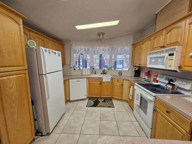This one-owner 2-bedroom 2 bath home has 1240 square feet and is on Big Cypress Golf and Country Club in Florida - for sale on GolfHomes.com, golf home, golf lot