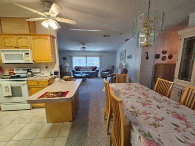 This one-owner 2-bedroom 2 bath home has 1240 square feet and is on Big Cypress Golf and Country Club in Florida - for sale on GolfHomes.com, golf home, golf lot