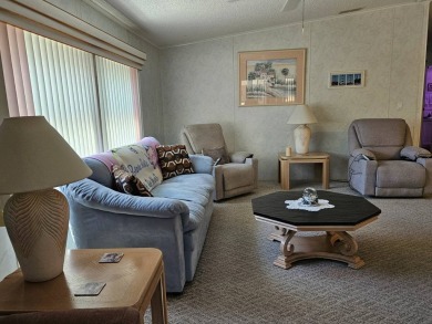 This one-owner 2-bedroom 2 bath home has 1240 square feet and is on Big Cypress Golf and Country Club in Florida - for sale on GolfHomes.com, golf home, golf lot