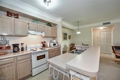 TOP FLOOR 2 bed/2 bath condo in Royal Greens @ Gateway WITH GOLF on Gateway Golf and Country Club in Florida - for sale on GolfHomes.com, golf home, golf lot
