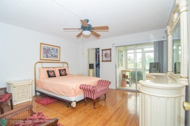 Step into the epitome of serene living with this delightful on Wynmoor Golf Course in Florida - for sale on GolfHomes.com, golf home, golf lot