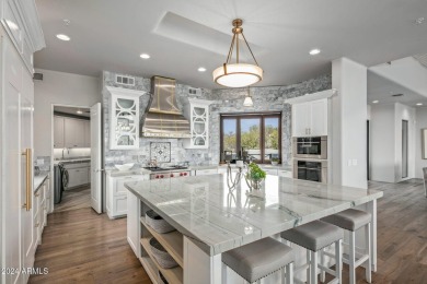 Welcome to 411 Eagle Feather, a beautifully updated custom home on Desert Mountain Golf Club - Renegade Course in Arizona - for sale on GolfHomes.com, golf home, golf lot