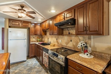 Welcome to the gated community of Queen's Bay Resort & on London Bridge Golf Course in Arizona - for sale on GolfHomes.com, golf home, golf lot