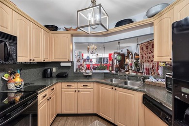 Spacious and rarely available corner unit , 3 bedroom, 2 on Sunrise Lakes Phase IV Golf Course in Florida - for sale on GolfHomes.com, golf home, golf lot