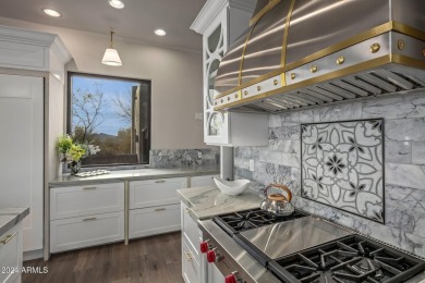 Welcome to 411 Eagle Feather, a beautifully updated custom home on Desert Mountain Golf Club - Renegade Course in Arizona - for sale on GolfHomes.com, golf home, golf lot