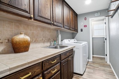 Welcome to Pecan Plantation Country Club and this home that is on Pecan Plantation Country Club in Texas - for sale on GolfHomes.com, golf home, golf lot