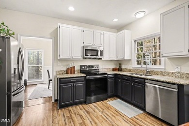 Located in the desirable Hedingham Golf Community, this inviting on Hedingham Golf and Athletic Club in North Carolina - for sale on GolfHomes.com, golf home, golf lot