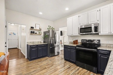 Located in the desirable Hedingham Golf Community, this inviting on Hedingham Golf and Athletic Club in North Carolina - for sale on GolfHomes.com, golf home, golf lot