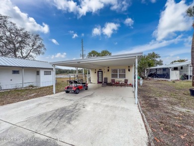 SNOWBIRDS OR HOMEOWNERS WELCOME- YOU OWN the land. 2 Bedroom on Glen Lakes Country Club in Florida - for sale on GolfHomes.com, golf home, golf lot