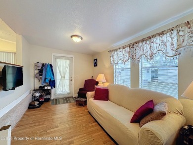 SNOWBIRDS OR HOMEOWNERS WELCOME- YOU OWN the land. 2 Bedroom on Glen Lakes Country Club in Florida - for sale on GolfHomes.com, golf home, golf lot