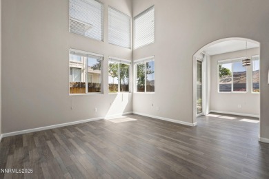 Welcome home to the serene mountain and wetland views in Heron's on Rosewood Lakes Golf Course in Nevada - for sale on GolfHomes.com, golf home, golf lot