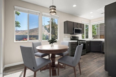 Welcome home to the serene mountain and wetland views in Heron's on Rosewood Lakes Golf Course in Nevada - for sale on GolfHomes.com, golf home, golf lot