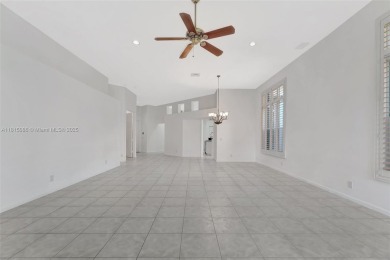 NICE... 3 BEDROOMS 3 FULL BATHROOMS ONE STORY WATERFRONT HOME on Weston Hills Country Club in Florida - for sale on GolfHomes.com, golf home, golf lot