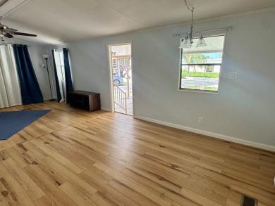 This updated 1985 single-wide mobile home offers just over 800 on Heather Hills Golf Course in Florida - for sale on GolfHomes.com, golf home, golf lot