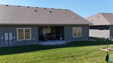 This custom-built 3-bedroom, 2-bath home backs to the 5th hole on The Bridges At Beresford in South Dakota - for sale on GolfHomes.com, golf home, golf lot