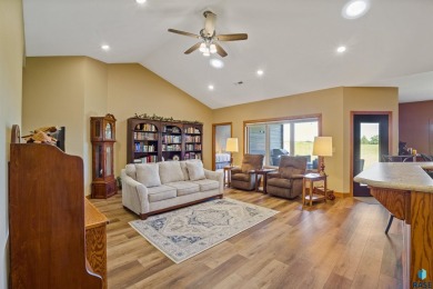 This custom-built 3-bedroom, 2-bath home backs to the 5th hole on The Bridges At Beresford in South Dakota - for sale on GolfHomes.com, golf home, golf lot