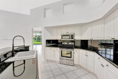 NICE... 3 BEDROOMS 3 FULL BATHROOMS ONE STORY WATERFRONT HOME on Weston Hills Country Club in Florida - for sale on GolfHomes.com, golf home, golf lot