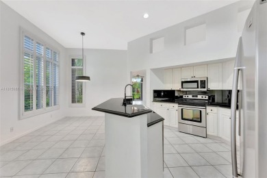 NICE... 3 BEDROOMS 3 FULL BATHROOMS ONE STORY WATERFRONT HOME on Weston Hills Country Club in Florida - for sale on GolfHomes.com, golf home, golf lot