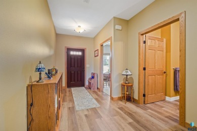 This custom-built 3-bedroom, 2-bath home backs to the 5th hole on The Bridges At Beresford in South Dakota - for sale on GolfHomes.com, golf home, golf lot