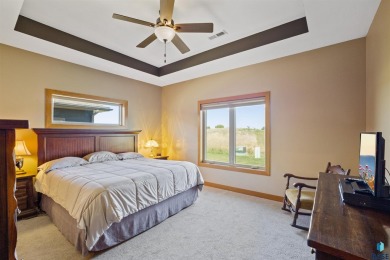 This custom-built 3-bedroom, 2-bath home backs to the 5th hole on The Bridges At Beresford in South Dakota - for sale on GolfHomes.com, golf home, golf lot