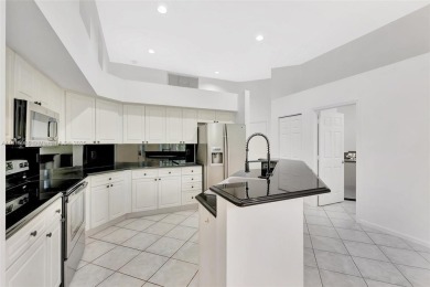 NICE... 3 BEDROOMS 3 FULL BATHROOMS ONE STORY WATERFRONT HOME on Weston Hills Country Club in Florida - for sale on GolfHomes.com, golf home, golf lot