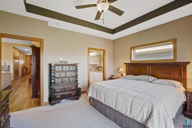 This custom-built 3-bedroom, 2-bath home backs to the 5th hole on The Bridges At Beresford in South Dakota - for sale on GolfHomes.com, golf home, golf lot