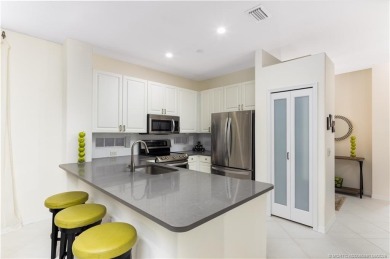Discover the perfect blend of modern comfort and style in this on Eagle Marsh Golf Club in Florida - for sale on GolfHomes.com, golf home, golf lot