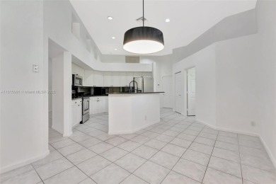 NICE... 3 BEDROOMS 3 FULL BATHROOMS ONE STORY WATERFRONT HOME on Weston Hills Country Club in Florida - for sale on GolfHomes.com, golf home, golf lot