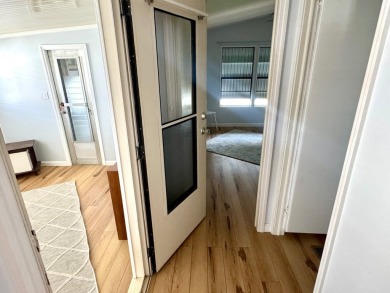 This updated 1985 single-wide mobile home offers just over 800 on Heather Hills Golf Course in Florida - for sale on GolfHomes.com, golf home, golf lot