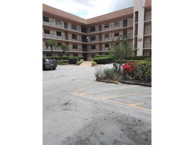 Nicely upgraded, top floor, fully tiled condo with screened on Sunrise Lakes Phase IV Golf Course in Florida - for sale on GolfHomes.com, golf home, golf lot