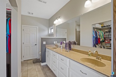 This custom-built 3-bedroom, 2-bath home backs to the 5th hole on The Bridges At Beresford in South Dakota - for sale on GolfHomes.com, golf home, golf lot