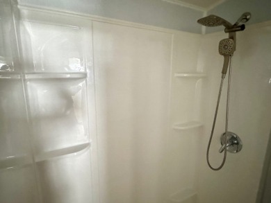 This updated 1985 single-wide mobile home offers just over 800 on Heather Hills Golf Course in Florida - for sale on GolfHomes.com, golf home, golf lot